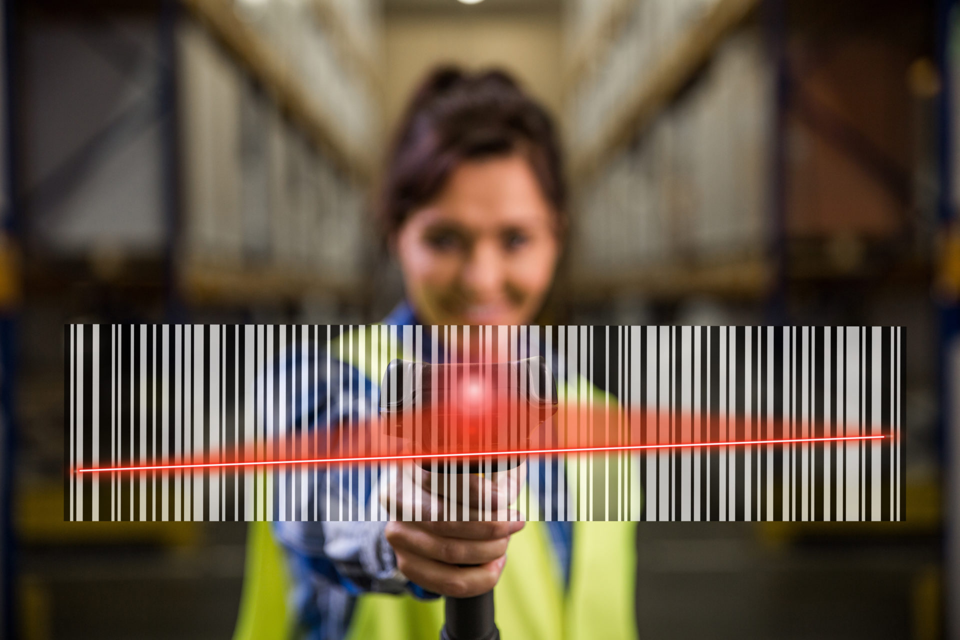 Concept photo of a woman scanning a bar code with a hand scanner